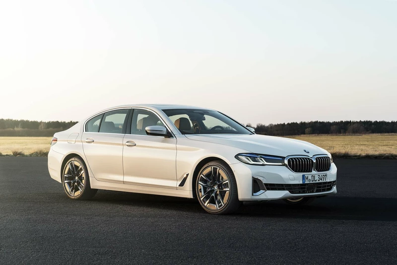 The redesigned 2021 BMW 5 Series luxury sedan dives deeper into the high-tech future of the BMW 5 Series