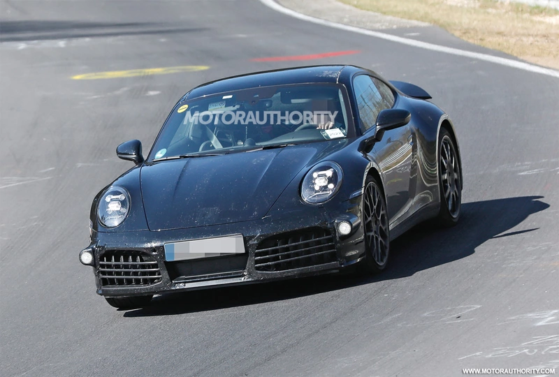 Spy shots and video of the 2024 Porsche 911 Hybrid: the electrified sports car is here.