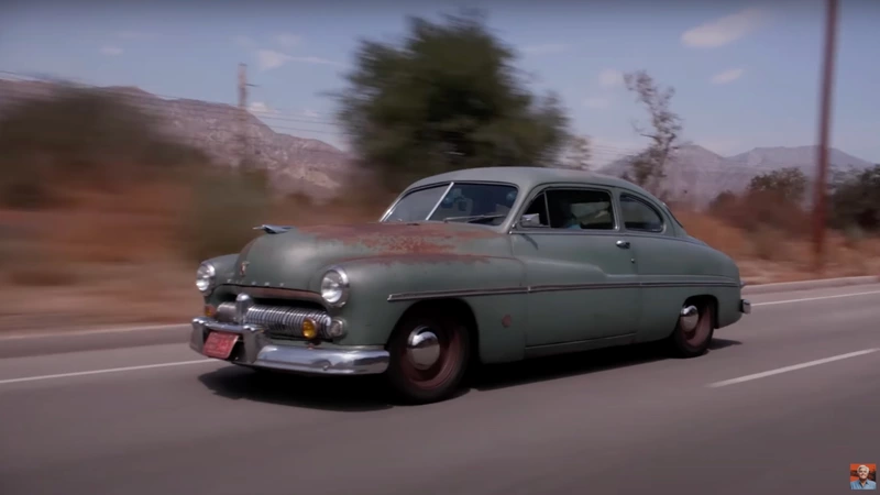 Iconic 1949 Mercury Coupe powered by Tesla, crashing into Jay Leno's garage.